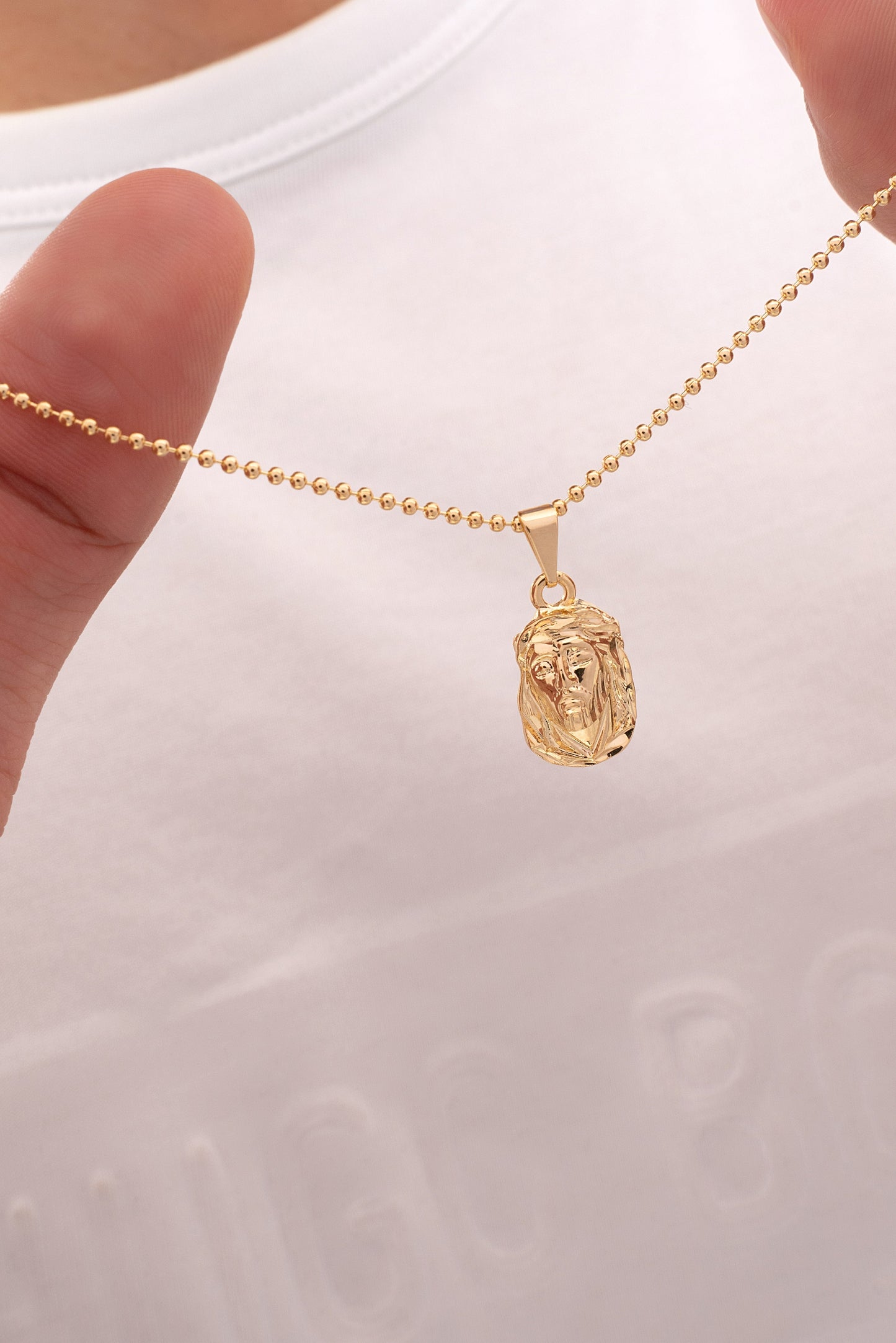 REF: 24552 Dije Rostro Tallado Diamantado